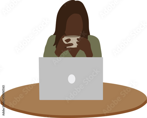 A black girl sits at a table with a laptop and drinks coffee