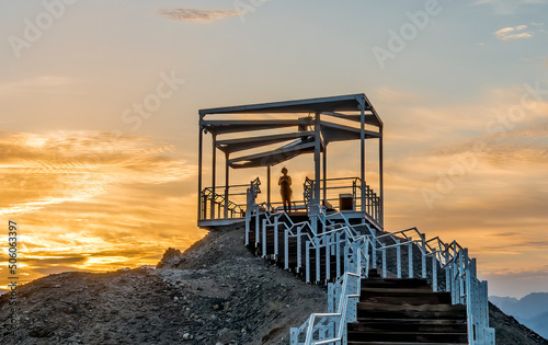 Decorative pergola and safe walkway to the stone summit in public park of Eil...
