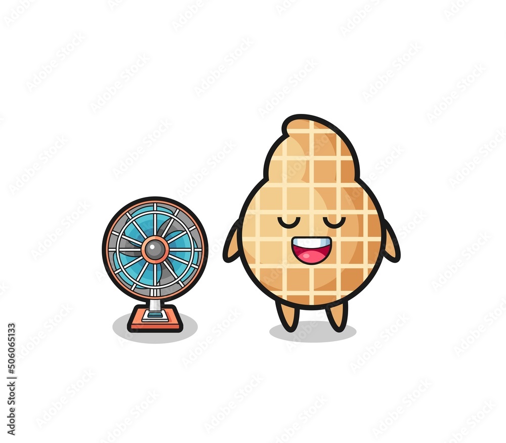 cute peanut is standing in front of the fan
