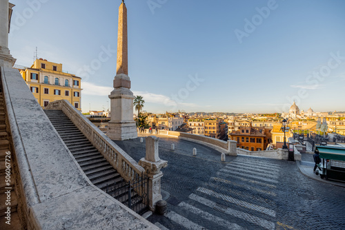 Morning cityscape view from the top of Spanish stairs with Sallustiano obelisk in Rome. Traveling Italy concept. Idea of visiting famous italian landmarks