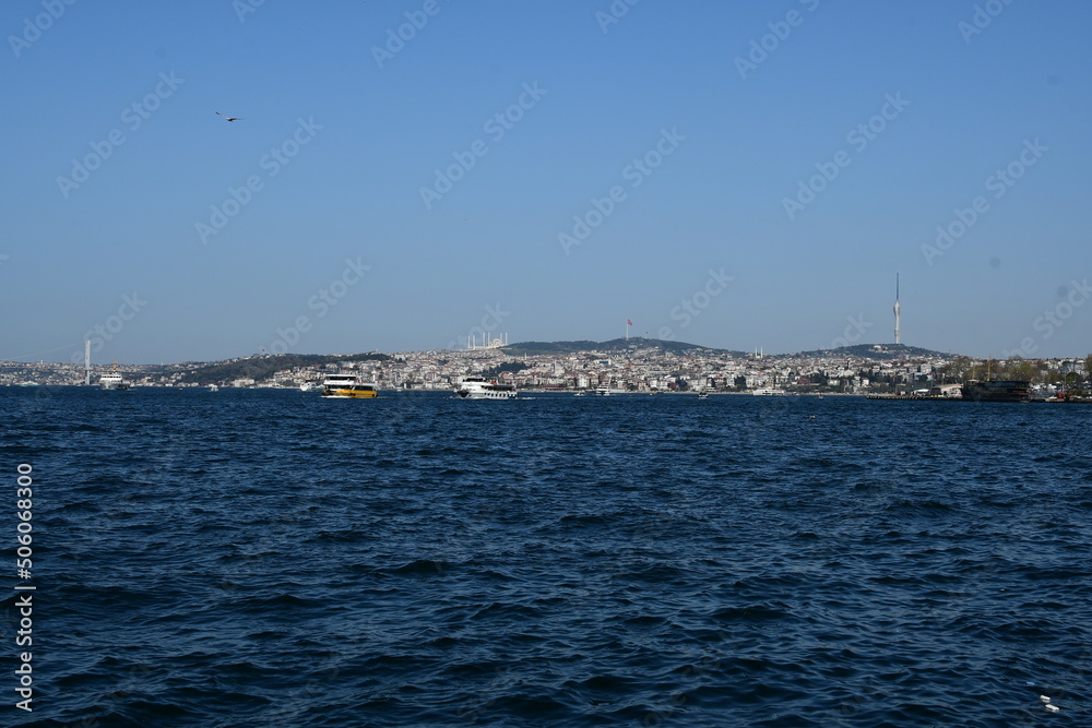 Panoramic view of the Bosphorus and coastline with mountains. Sunny day and blue sky.