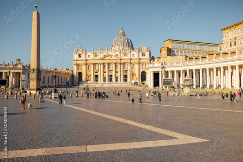 Saint Peter's Square with Vaticano Obelisk and church in Rome on sunny day. Concept of religious landmarks and travel Italy