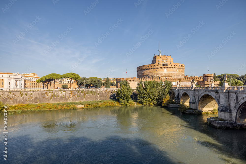 Landscape of Tiber river and Castle of the Holy Angel in Rome. Traveling Italy concept. Idea of visiting famous italian landmarks