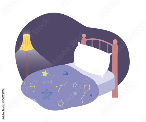 Bedroom nursery interior, light from lamp, blue bedclothes with stars on single boys bed