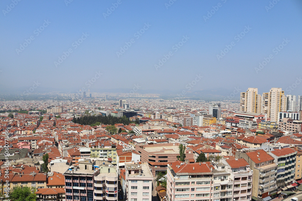 Wide view of Bursa City from the top, photo of Tophane Bursa clock tower observation hill from the top high upper place with selective focus effect. 