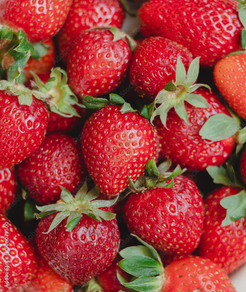Fresh red strawberries close up. Natural berries background. Fresh red strawberries close up. Natural berries background.