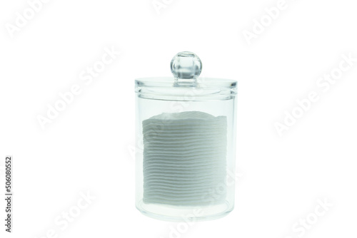 Cotton pads in container isolated on white background