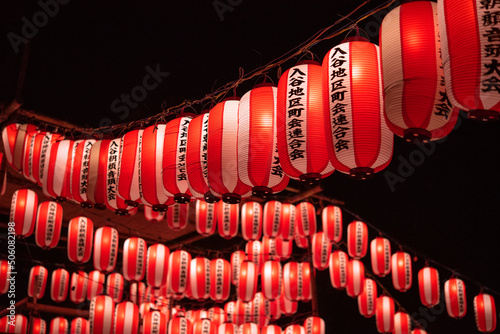 Photography Japanese red paper lanterns hanging for traditional summer festival at night