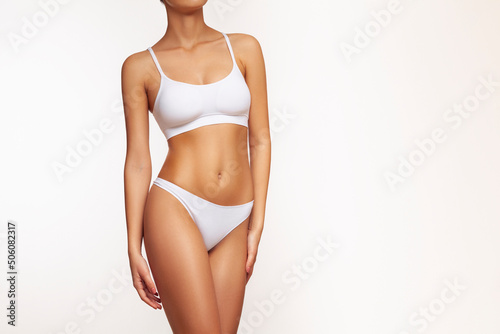 Woman body slim shape, fit female figure, waist, legs and abdomen in underwear