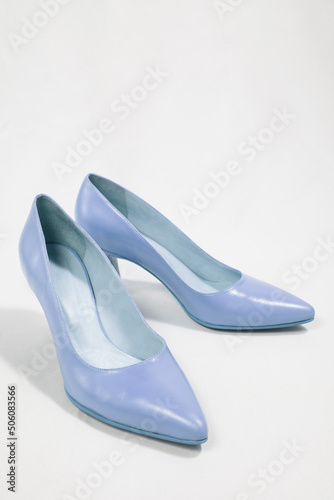 Medium high heel , light blue color, women shoes isolated on white background