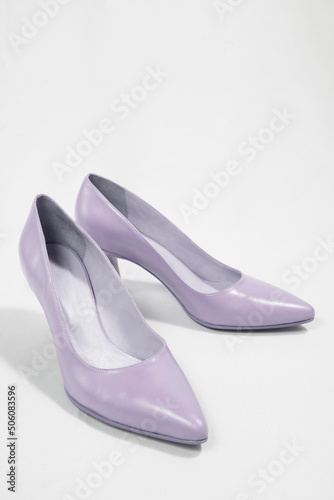 Medium high heel , light purpple color, women shoes isolated on white background