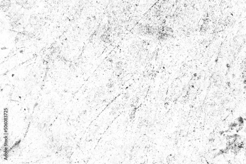 Scattered dark grunge texture and spots on white surface