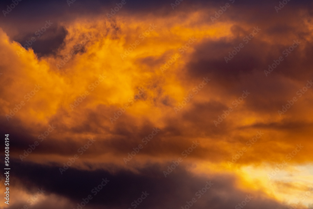 sunset in the sky with dramatic clouds