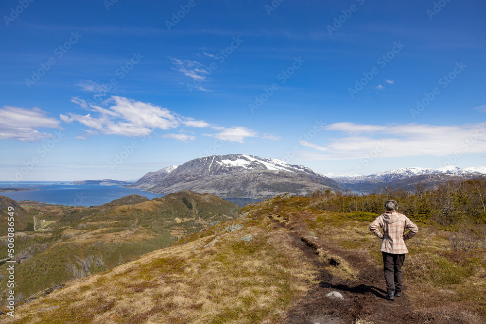 Happy woman hiking in Gåsheia mountains,Northern Norway,scandinavia,Europe