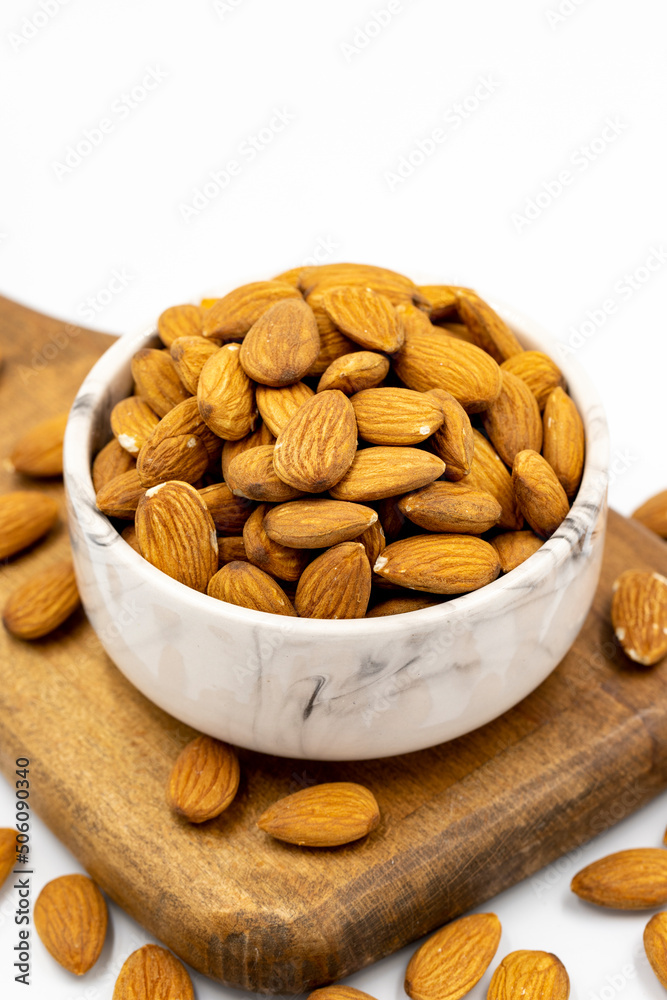 Almond nuts isolated on a white background. Organic nuts. close up Almond nuts isolated on a white background. Organic nuts. close up