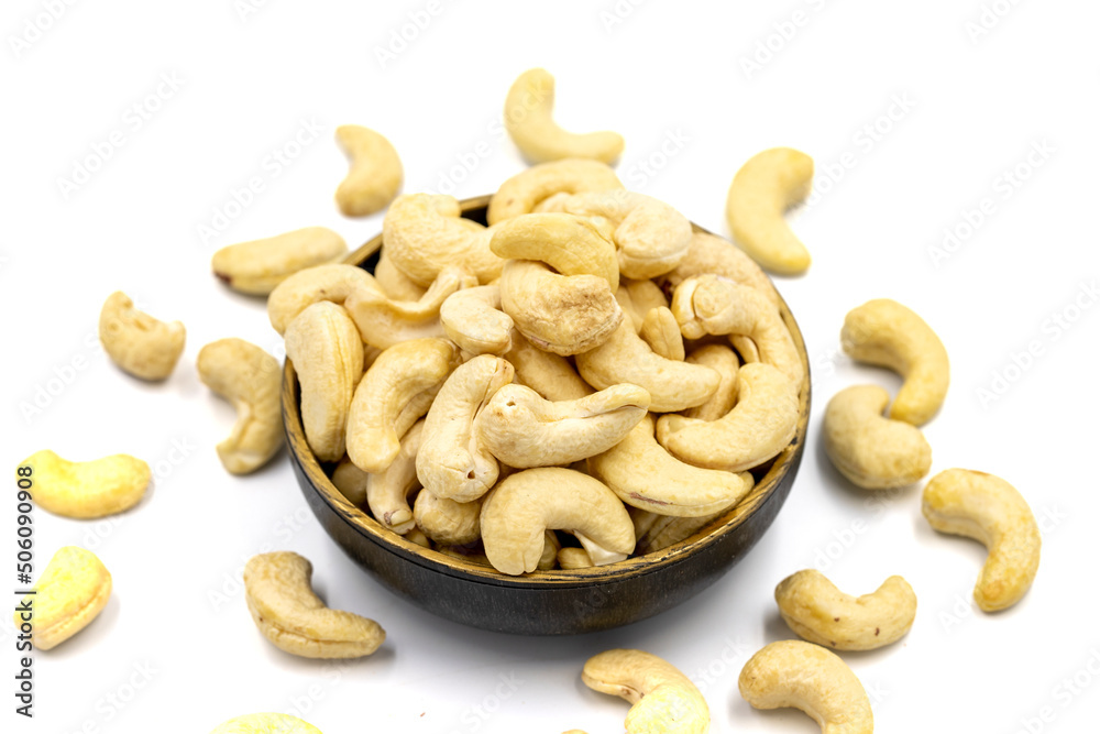 Cashew nuts isolated on white background. Organic nuts. close up Cashew nuts isolated on white background. Organic nuts. close up