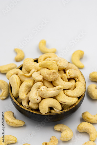 Cashew nuts isolated on white background. Organic nuts. close up