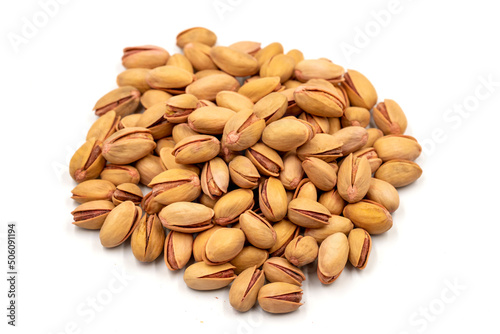 Pistachio nuts isolated on white background. Organic nuts. close up