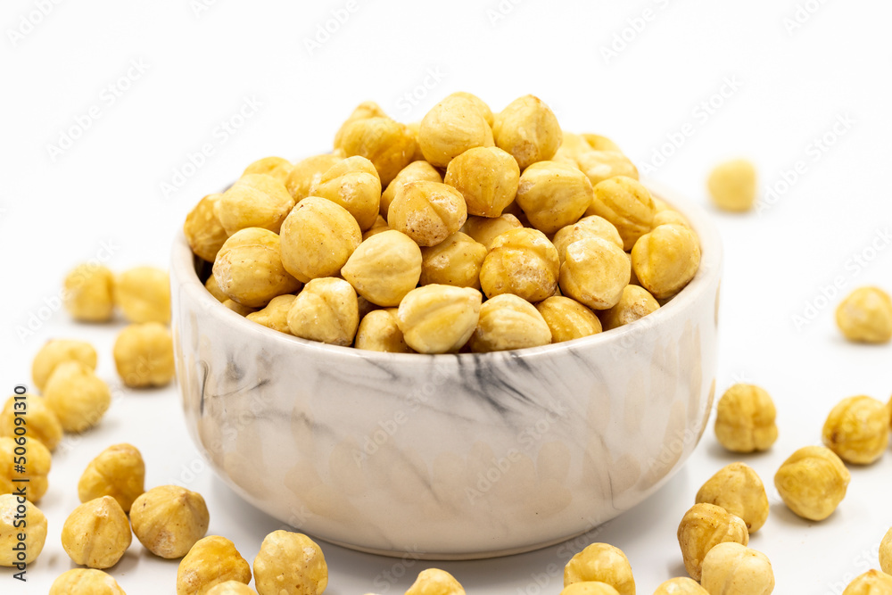 Roasted hazelnut nut isolated on white background. Organic nuts. close up Roasted hazelnut nut isolated on white background. Organic nuts. close up