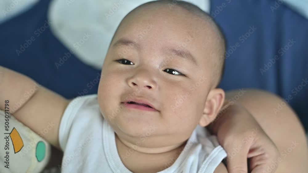 Closeup face baby smile slow motion, kid cute and happy Closeup face baby smile slow motion, kid cute and happy
