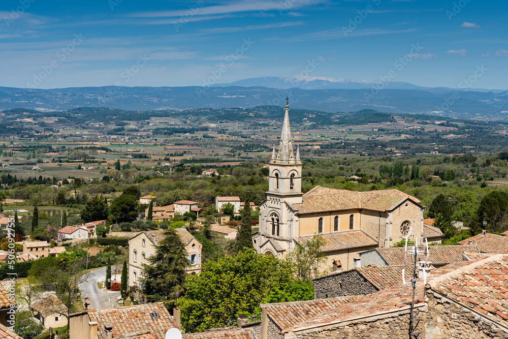 
Luberon landscape view with cathedral of Bonnieux and the Mont Ventoux on the background, Provence, France 