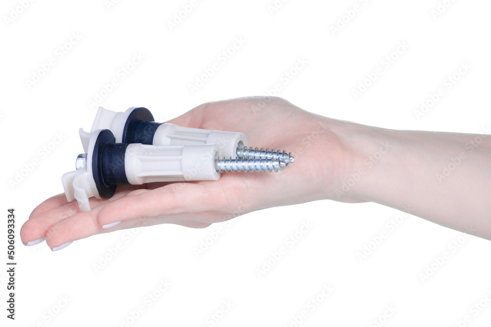 Shipping bolts for washing machine in hand on white background isolation Shipping bolts for washing machine in hand on white background isolation