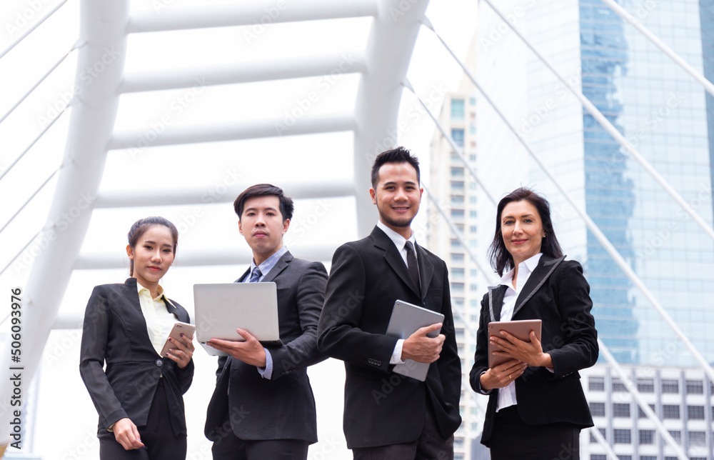 startup business team work with computer laptop and smart tablet in downtown office with successful and happy project partner connection discuss startup business team work with computer laptop and smart tablet in downtown office with successful and happy project partner connection discuss