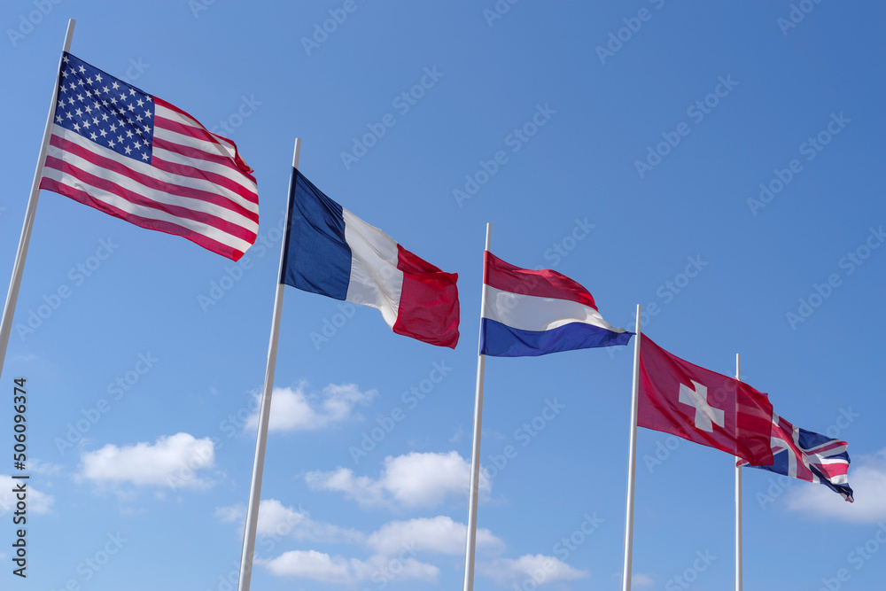 Flags waving on a sunny day Flags waving on a sunny day