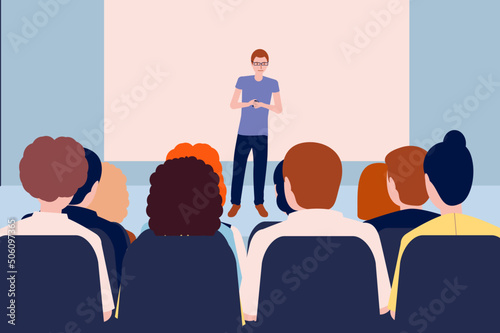 Speaker Giving a Talk at Business Meeting. Audience in the conference hall. Business and Entrepreneurship. Copy space on white board.
