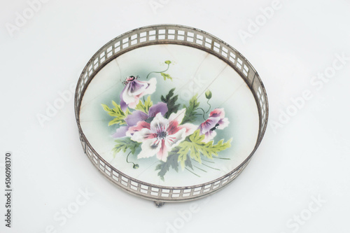 Vintage porcelain tray with a metal corf photo