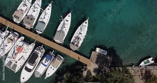 Top view of beautiful yachts in the marina filmed from the air 