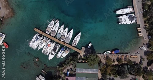 Top view of beautiful yachts in the marina filmed from the air 