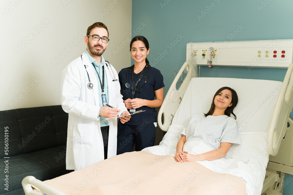 Medical staff with a hospitalized patient Medical staff with a hospitalized patient