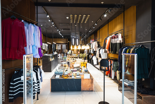 Interior of a brand new fashion clothing store. Panorama, Vilnius, Lithuania 10 April 2022