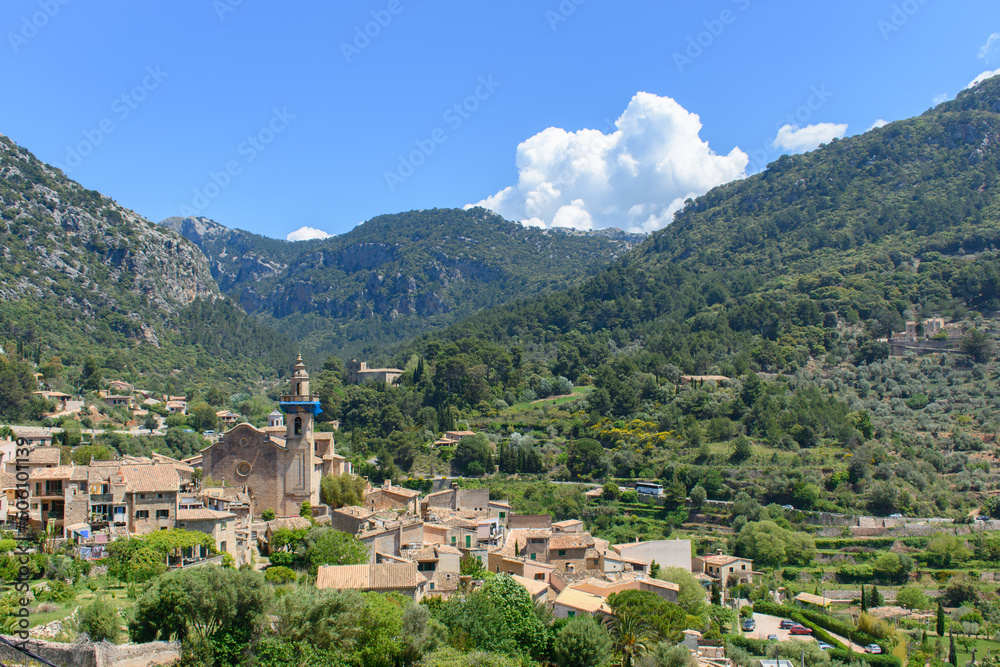 View of Valldemossa, Mallorca, Spain. Village in the valley surrounded by mountains.