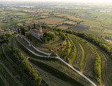 Aerial footage view from the drone of a ancient fortress built on a green hill