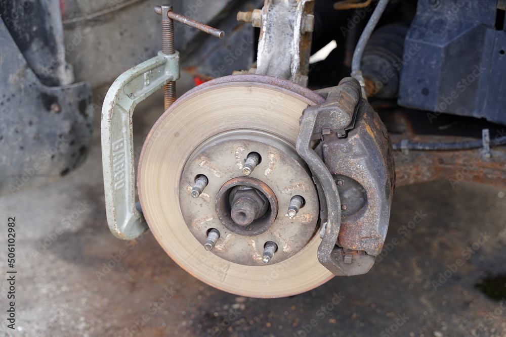 Vehicle metal rotor and front passenger brake caliper and brake pad Vehicle metal rotor and front passenger brake caliper and brake pad
