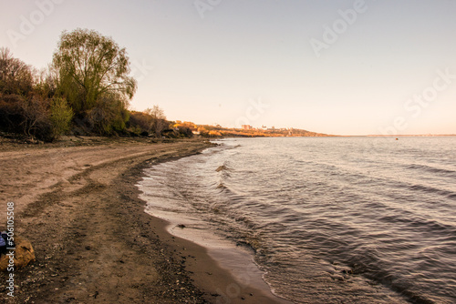 Fototapeta Naklejka Na Ścianę i Meble -  Volga river bank with waves and stones