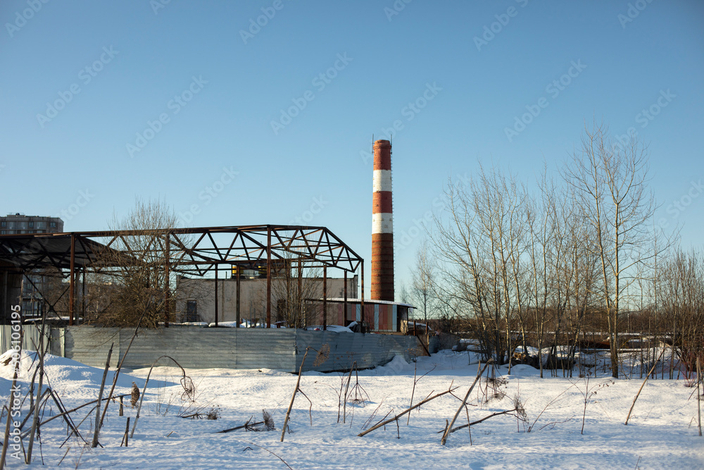 Industrial type. Landscape with trumpet. Industrial zone in winter.