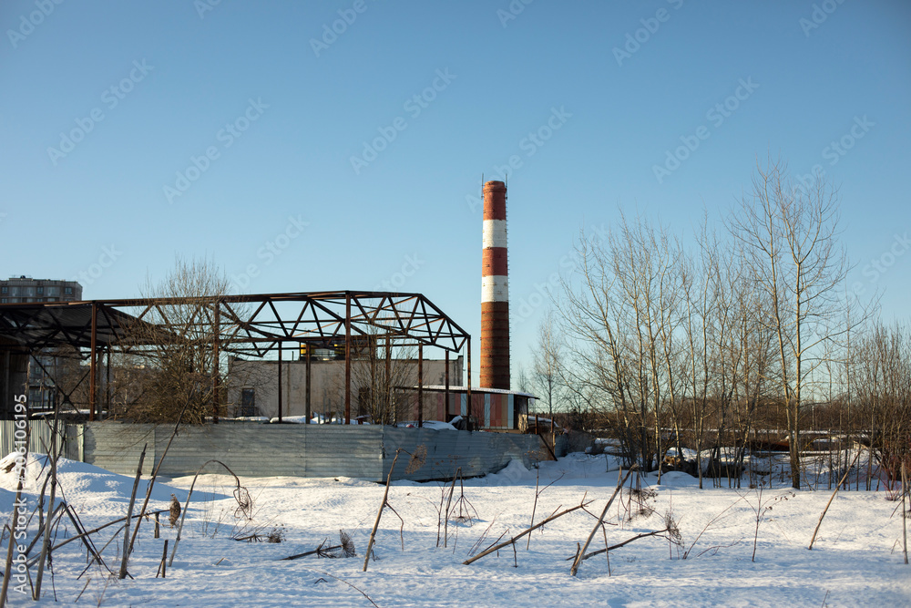 Obraz premium Industrial type. Landscape with trumpet. Industrial zone in winter.