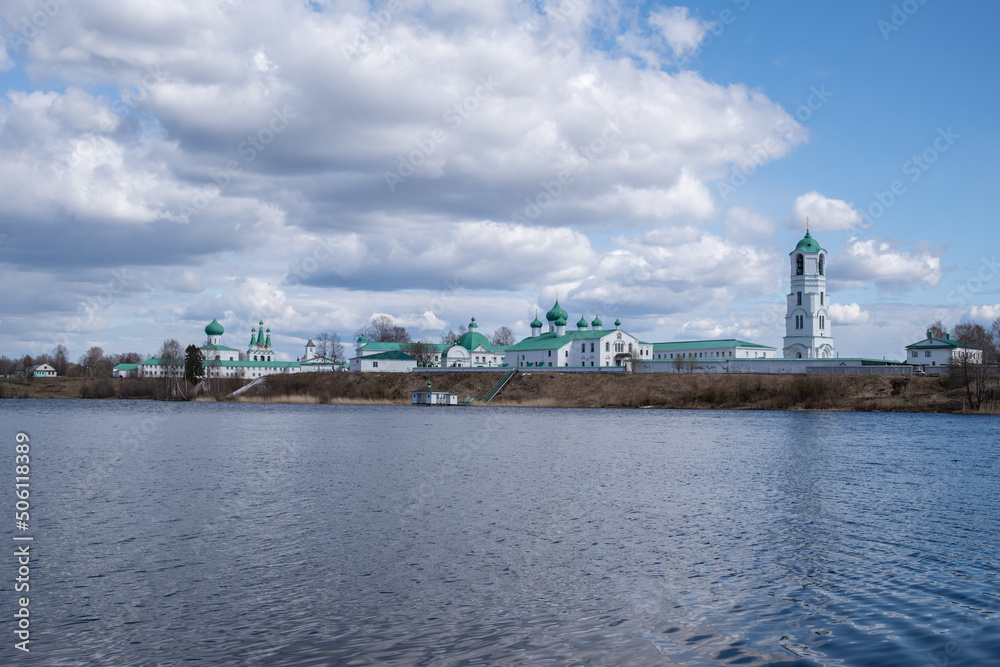 View of the Roshchinsky Lake and the Trinity Alexander-Svirsky Monastery. Village Staraya Sloboda, Leningrad region, Russia
