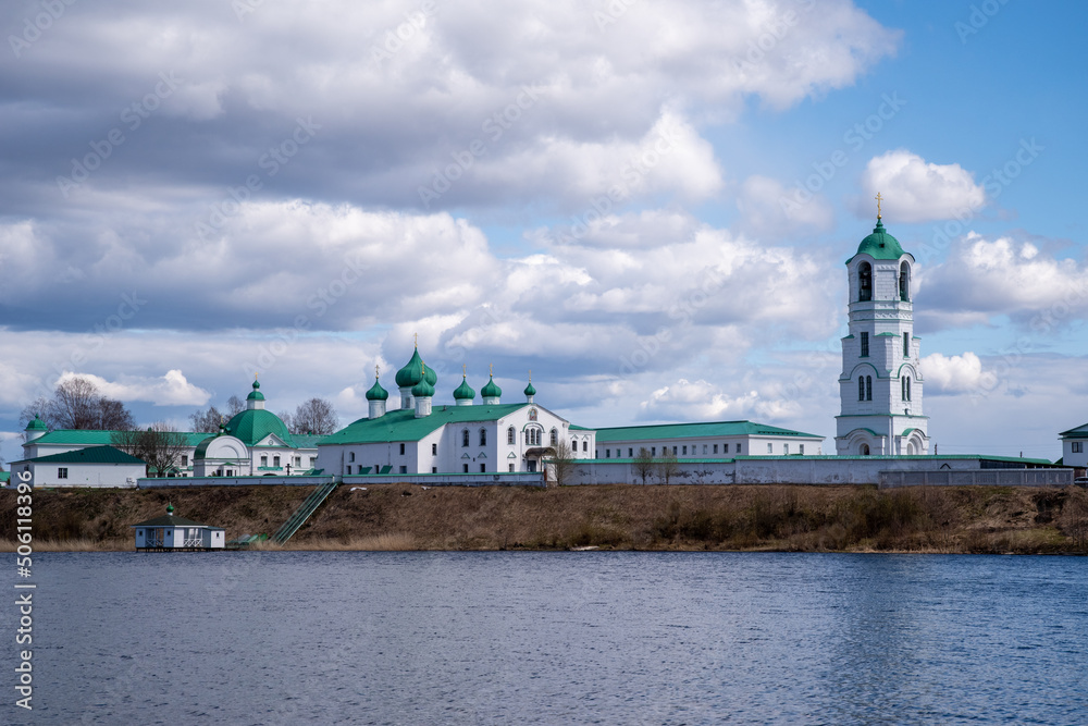 View of the Roshchinsky Lake and the Trinity Alexander-Svirsky Monastery. Village Staraya Sloboda, Leningrad region, Russia