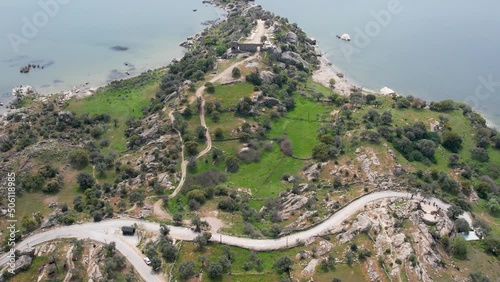 Lake Bafa is a lake and a nature reserve situated in southwestern. At the innermost north-east tip of the lake is the village of Kapikiri, as well as the ruins of Heraclea by Latmus. photo