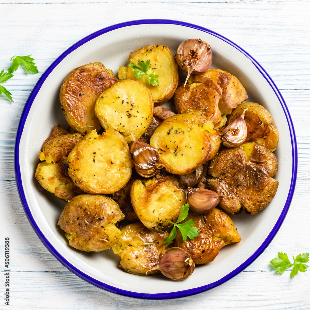 Crispy smashed baked potatoes. Top view, copy space. Crispy smashed baked potatoes. Top view, copy space.
