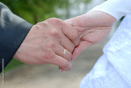 The hands of the newlyweds.