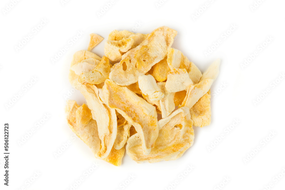 Freeze dried mango slices in a heap isolated over white. Top down view Freeze dried mango slices in a heap isolated over white. Top down view