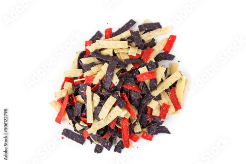 Festive colored tortilla chip strips in red white and blue. Top down view