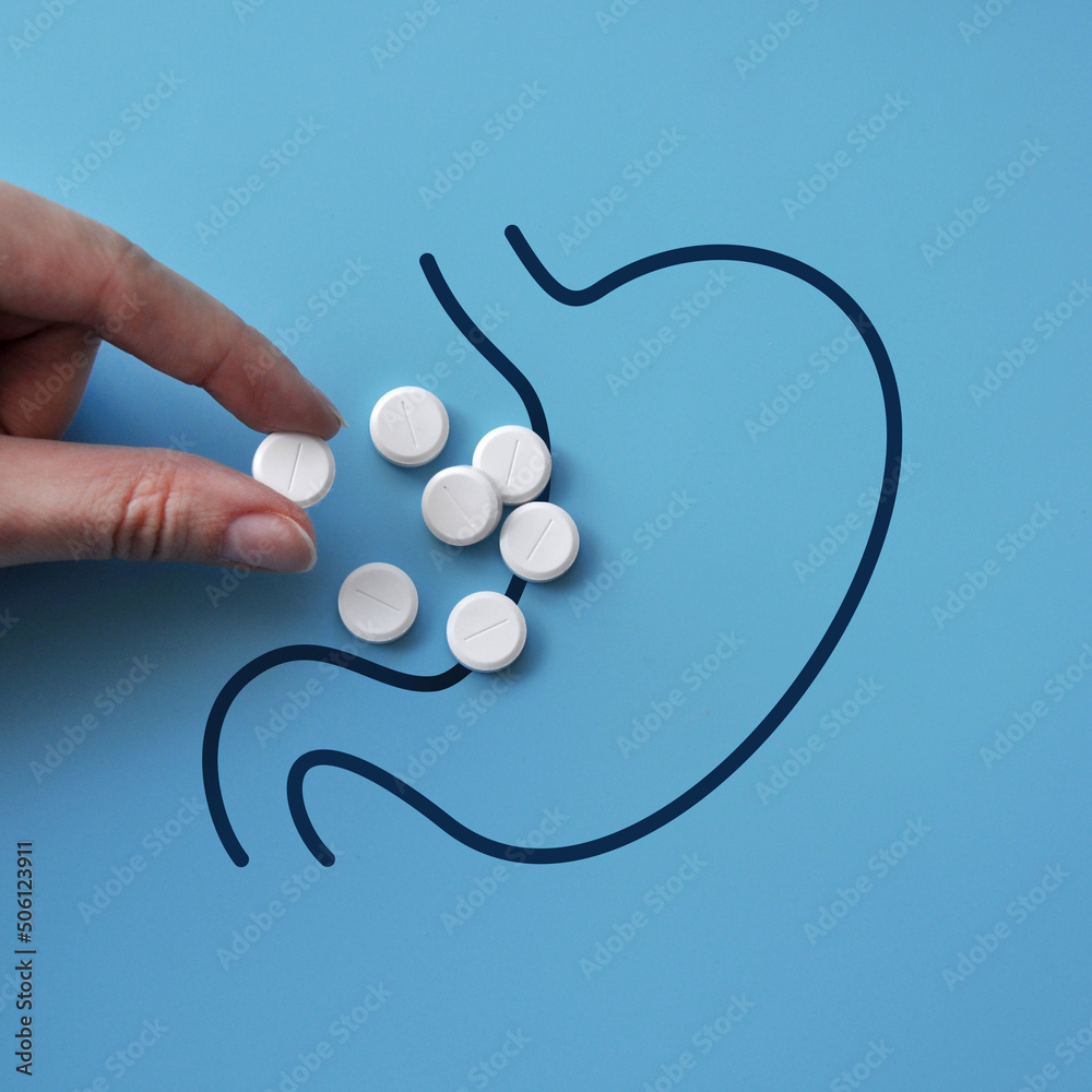 Lots of pills in the stomach. A symbol of uncontrolled selfmedication