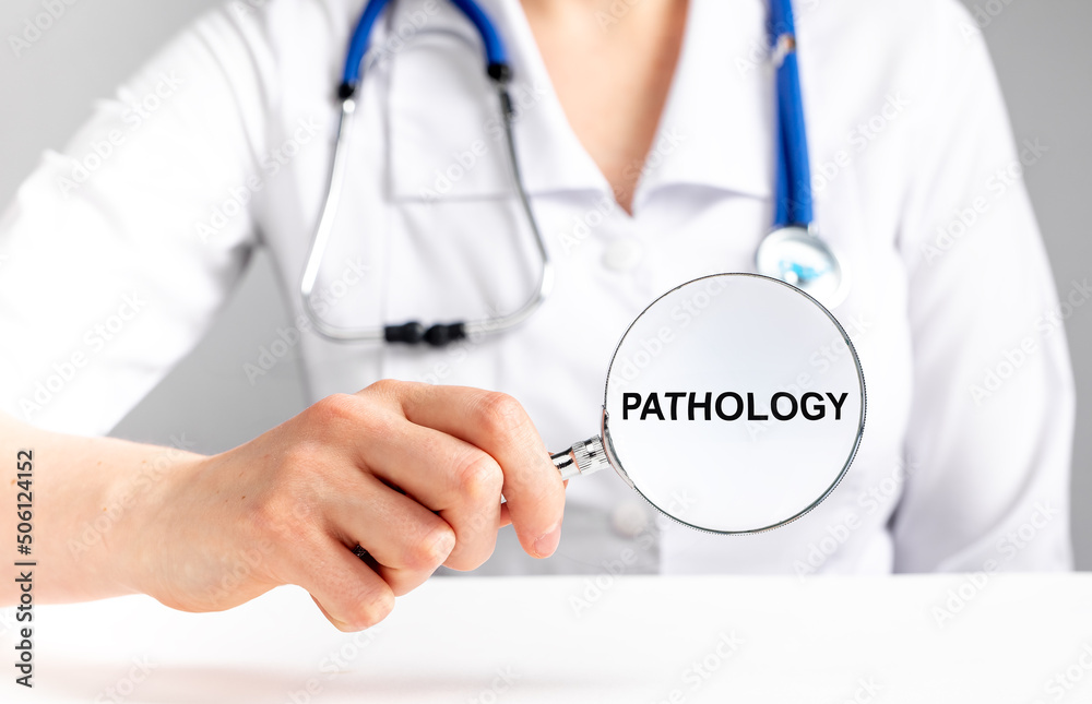 Doctor with magnifying glass in hand diagnosing pathologies. Medical checkup, health care, physical examination concept. Woman in lab coat with loupe. High quality photo Doctor with magnifying glass in hand diagnosing pathologies. Medical checkup, health care, physical examination concept. Woman in lab coat with loupe. High quality photo
