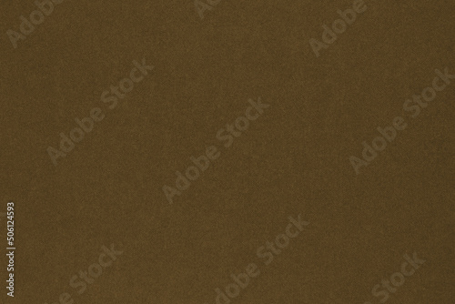 Dark brown colored paper texture. Textured surface with cellulose fibers.Tobacco coloured background or wallpaper